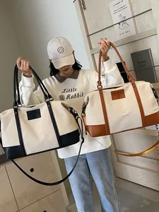 Large canvas travel tote bags in black and brown with leather handles for sport and yoga