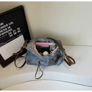 Top view of blue vintage tote bag showing large capacity for tablet and cosmetics