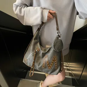 Chic greyish-green large capacity motorcycle style tote bag with vintage M leather patch