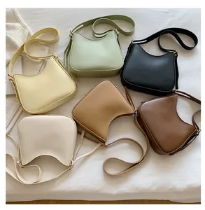 Minimalist half-moon underarm bags in six colors including yellow, green and brown