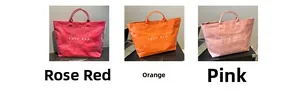 Tre borse tote colorate in Tyvek in rosa, arancione e rosa con ampio spazio per le donne