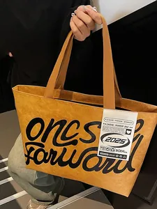 Waterproof DuPont paper tote bag in mustard yellow with once forward art text print