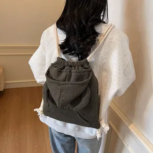 Fashionable olive green waffle knit backpack with cute ears for casual student travel