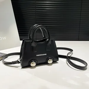 Black mini fashion motorcycle shell bag with silver wheels and white text branding
