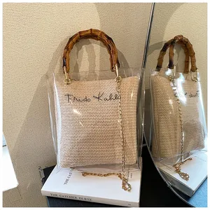 Detail view of transparent bag with bamboo handle and Frida Kahlo straw inner pouch