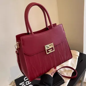Elegant burgundy wedding handbag with wave texture and golden clasp for bridesmaids