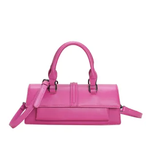 French style fuchsia leather baguette bag with top handles and adjustable shoulder strap