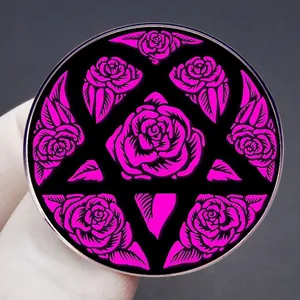 Gothic rose flower metal enamel brooch with symmetrical pink petals on black background