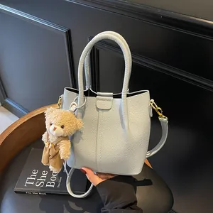 Women Fashion Litchi Pattern PU Leather Bucket Bag Minimalist Shoulder Crossbody Handbag With Teddy Bear Pendant