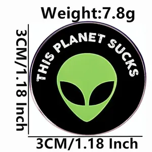 Funny alien enamel pin showing size 3cm and weight 7.8g on a white background