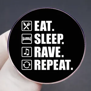 Funny 'Eat Sleep Rave Repeat' round metal enamel pin badge with icons for music lovers