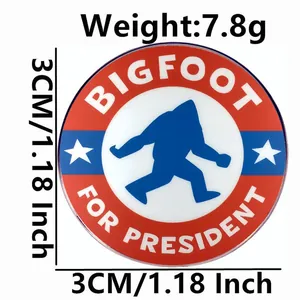 Humorous Bigfoot for President metal badge pin with red white and blue design