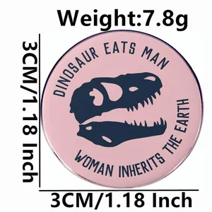 Pink dinosaur skull brooch with Dinosaur Eats Man Woman Inherits The Earth quote