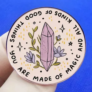Enamel pin badge with floral crystal design and You Are Made Of Magic quote