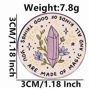 Round pink enamel pin with purple crystal and floral design, 3cm diameter and 7.8g weight