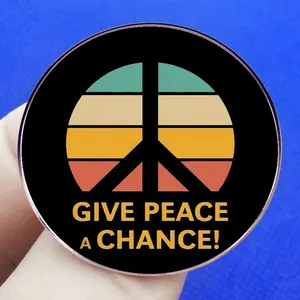 Give Peace a Chance enamel pin badge with retro rainbow colors and peace symbol