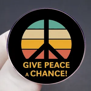 Give Peace a Chance vintage round enamel pin with colorful retro stripes on black background
