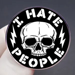 Round punk badge featuring I HATE PEOPLE slogan with a white skull and lightning icons