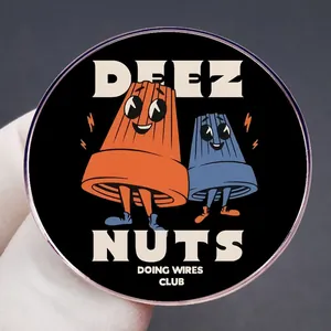 Retro Deez Nuts enamel pin with cartoon wire nuts characters and club lettering