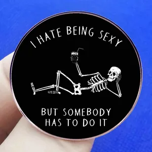 Funny skeleton brooch pin with I Hate Being Sexy text design on black metal badge