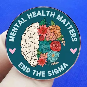 Mental health matters acrylic badge with floral brain design and end the stigma message