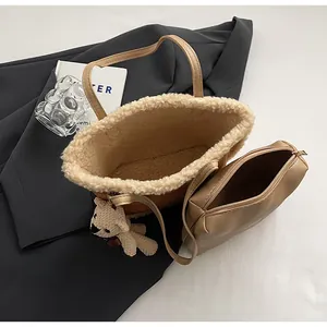 Detail of khaki faux fur tote bag showing the plush fleece lining and matching inner pouch
