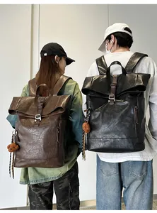 Detail of the high-quality PU leather texture and plush bear charm on this travel backpack