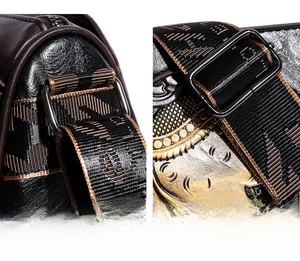 Detail of vintage leather bag showing gold elephant relief and patterned woven strap