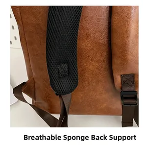 Detail of breathable honeycomb mesh shoulder straps on the brown leather backpack