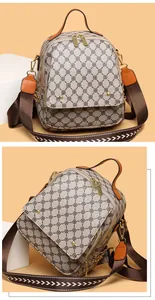 Detail of vintage geometric pattern backpack showing gold hardware and leather straps