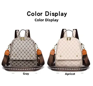 Detail view of gray and apricot printed backpacks with metal zippers and woven straps