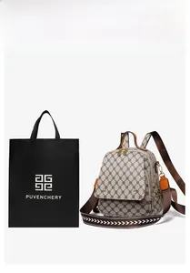 Detail view of the vintage print backpack with premium gift wrapping and branding