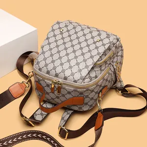 Retro geometric pattern backpack with adjustable brown nylon strap and gold hardware