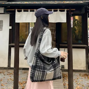 Chic black and white plaid wool tote bag with large capacity for autumn casual fashion look