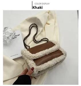 Close-up of khaki leather shoulder bag with white faux fur trim and vintage metal chain