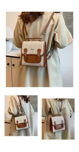 Detail of vintage canvas and leather backpack with metal bow and buckle straps