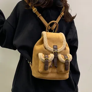 Vintage winter plush backpack featuring brown suede and white faux fur trim for women
