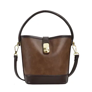 Retro brown contrast bucket bag with gold hardware and top handle for women