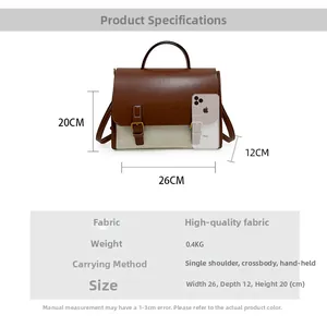 Detail view of vintage messenger bag showing dimensions 26x12x20cm and 0.4kg weight