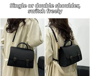 Black vintage satchel showing easy conversion between backpack and shoulder bag modes