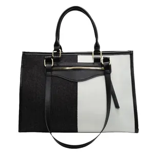 Bolso tote de lona en contraste blanco y negro con correa de hombro ajustable