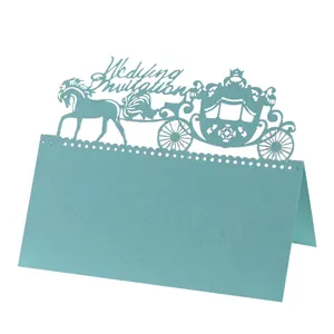 Laser-cut light blue wedding place card with a vintage horse carriage design