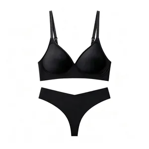 Detailed view of black seamless lingerie set with adjustable straps and V-string thong