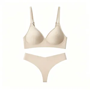 Detail of skin-tone seamless bra and thong set with adjustable straps and soft elastic fabric