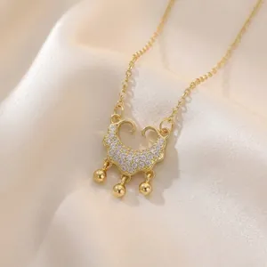 Gold-plated long life lock necklace with paved zircons and three polished beads