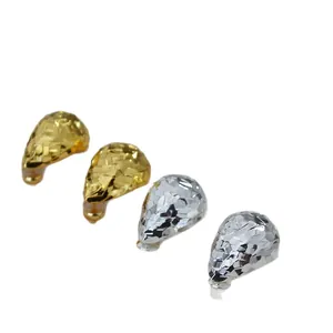 Faceted teardrop brass earrings with dragon scale texture in gold and silver plating