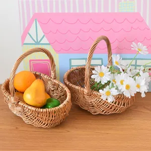 Close-up of woven wicker baskets used for fruits and fresh flowers on a wooden table
