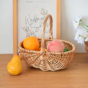 Detailed view of hand-woven wicker basket with sturdy handle holding fresh oranges