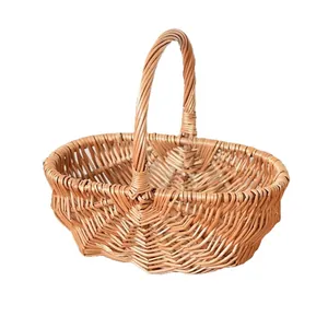 Handcrafted woven wicker basket with reinforced handle for picnic and storage