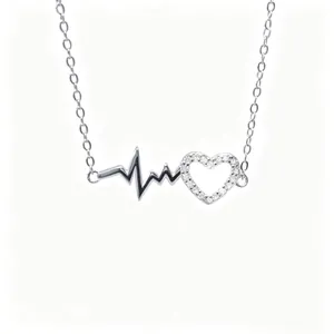 S925 sterling silver necklace featuring a heartbeat line and sparkling hollow heart pendant